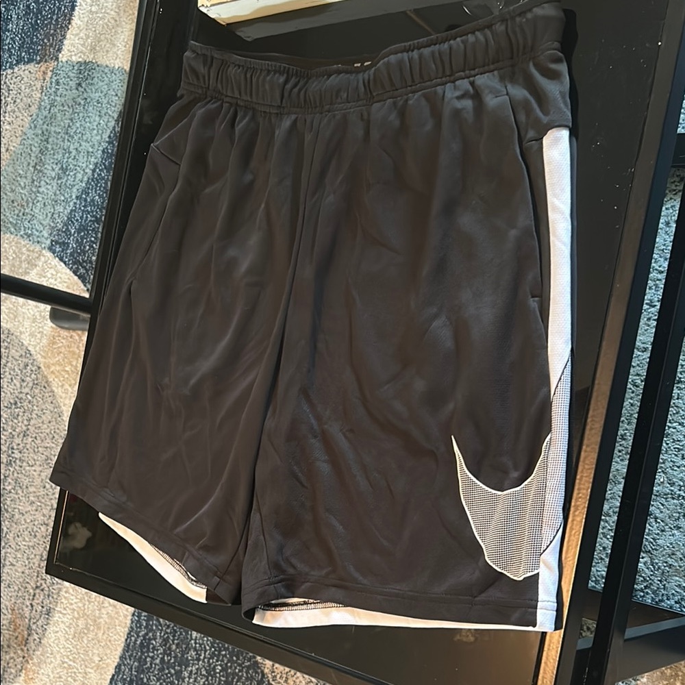 Nike Men's Black Shorts with White Swoosh